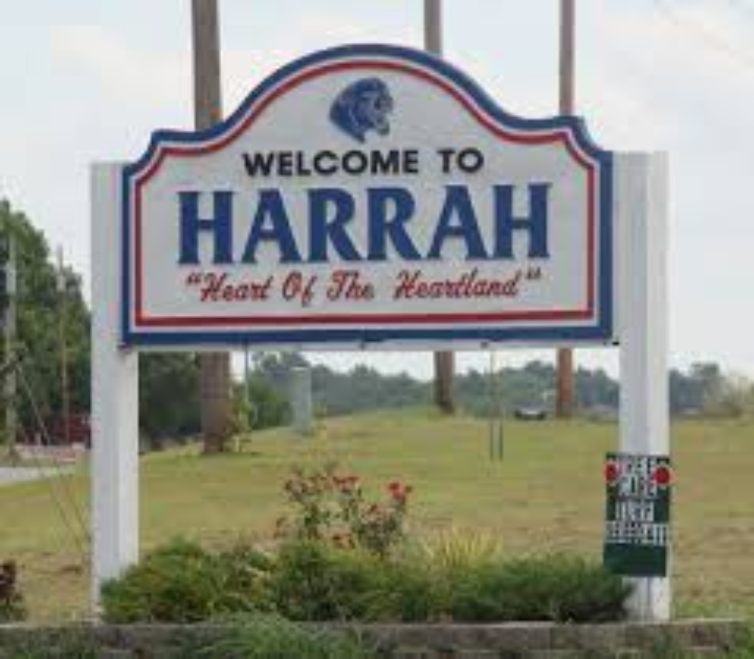 Welcome to Harrah, Heart of the Heartland roadside sign in Harrah, Oklahoma